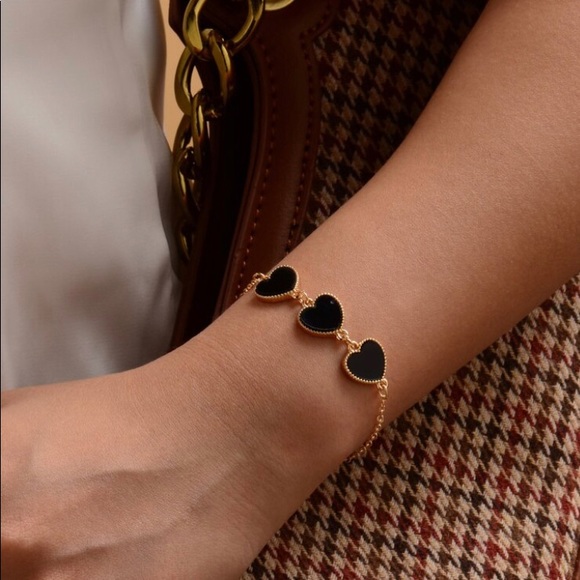 Gold tone bracelet with 3 hearts - Picture 2 of 3